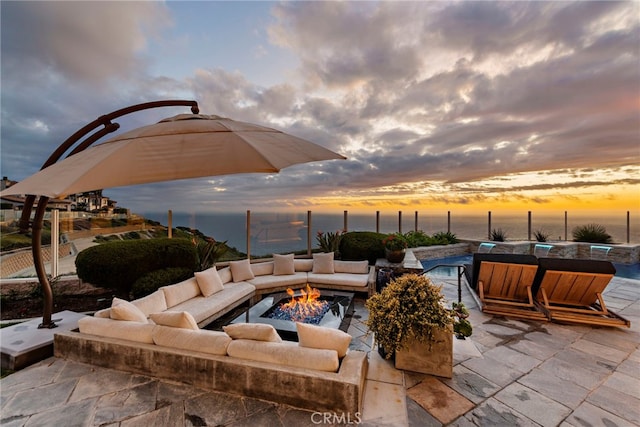 31821 Monarch Crst, Laguna Niguel, CA 92677 - view of patio featuring a water view, an outdoor fire pit, fence, and an outdoor pool