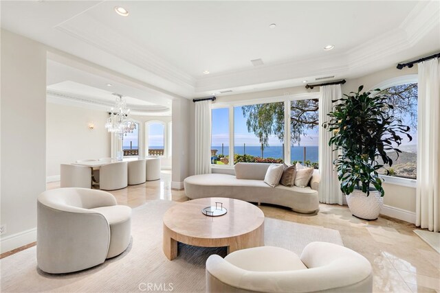 31821 Monarch Crst, Laguna Niguel, CA 92677 - living area with a raised ceiling, crown molding, a water view, recessed lighting, and a chandelier
