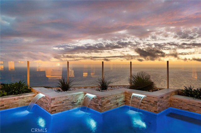 31821 Monarch Crst, Laguna Niguel, CA 92677 - pool at dusk with a water view and an outdoor pool