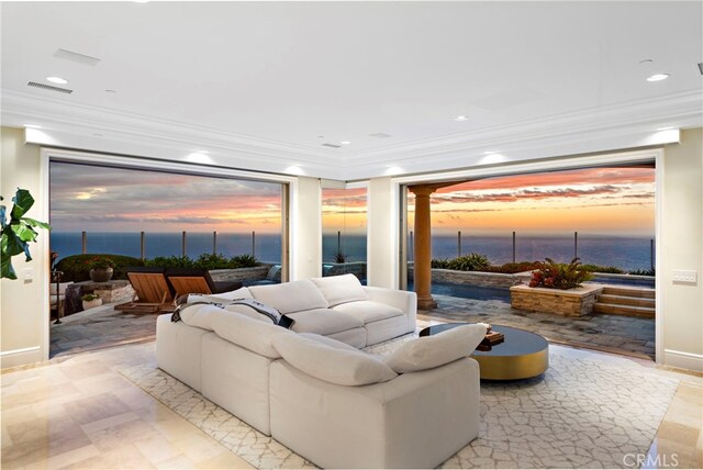 31821 Monarch Crst, Laguna Niguel, CA 92677 - living room featuring ornamental molding, recessed lighting, decorative columns, and a water view