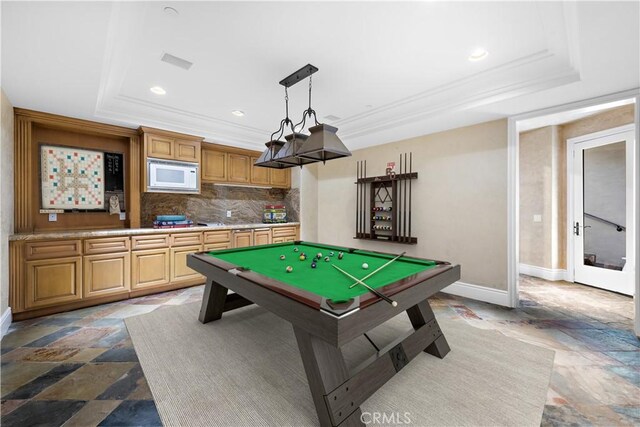 31821 Monarch Crst, Laguna Niguel, CA 92677 - rec room featuring a raised ceiling, stone tile floors, recessed lighting, crown molding, and billiards