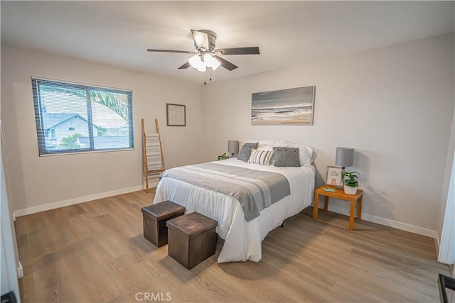 11845 Gladstone Ave, Sylmar, CA 91342 - bedroom featuring light wood finished floors, baseboards, and ceiling fan