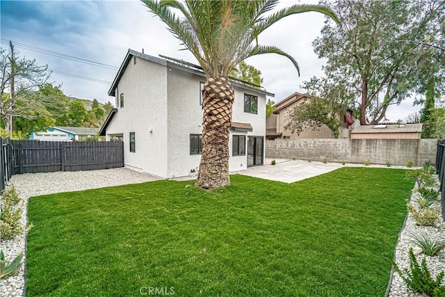 11845 Gladstone Ave, Sylmar, CA 91342 - rear view of house featuring a patio and stucco siding