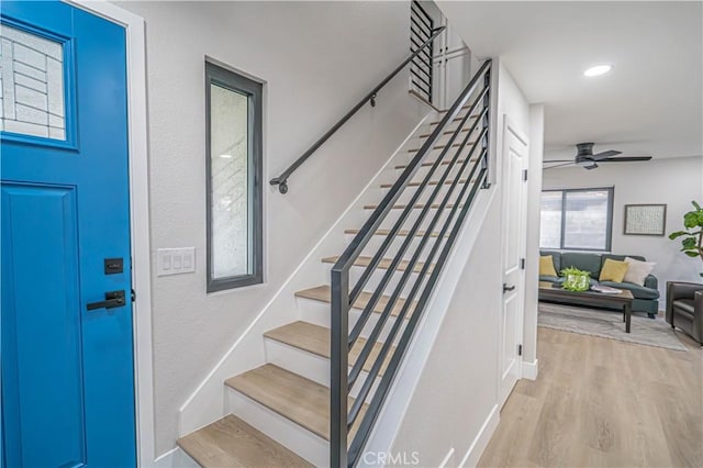 11845 Gladstone Ave, Sylmar, CA 91342 - staircase with ceiling fan, wood finished floors, baseboards, and recessed lighting