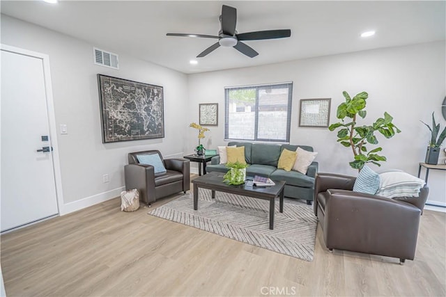 11845 Gladstone Ave, Sylmar, CA 91342 - living room with wood finished floors, ceiling fan, baseboards, and recessed lighting