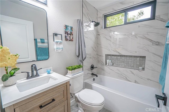 11845 Gladstone Ave, Sylmar, CA 91342 - full bathroom featuring toilet, vanity, shower / bath combination, and a textured wall