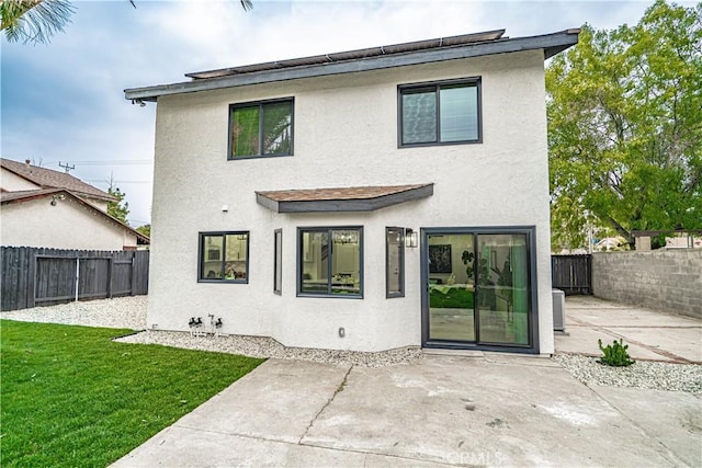 11845 Gladstone Ave, Sylmar, CA 91342 - back of house with a patio and stucco siding