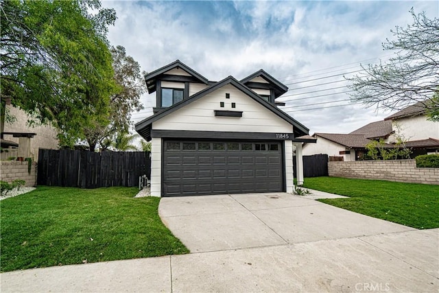 11845 Gladstone Ave, Sylmar, CA 91342 - view of front facade with a garage and driveway