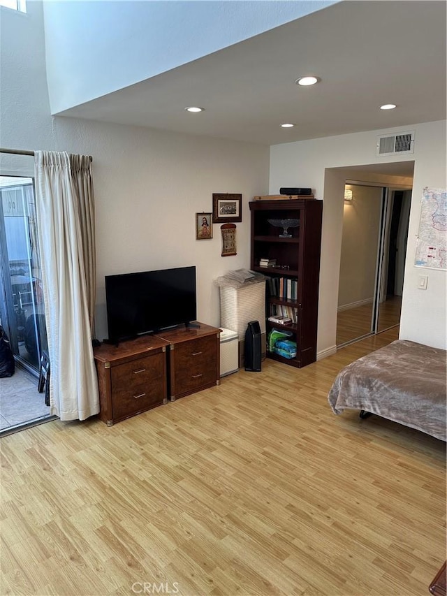1236 N Columbus Ave Unit 41, Glendale, CA 91202 - bedroom with wood finished floors and recessed lighting