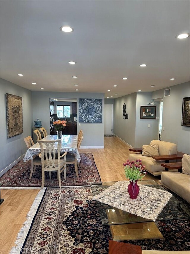 1236 N Columbus Ave Unit 41, Glendale, CA 91202 - dining space with light wood finished floors, recessed lighting, and baseboards