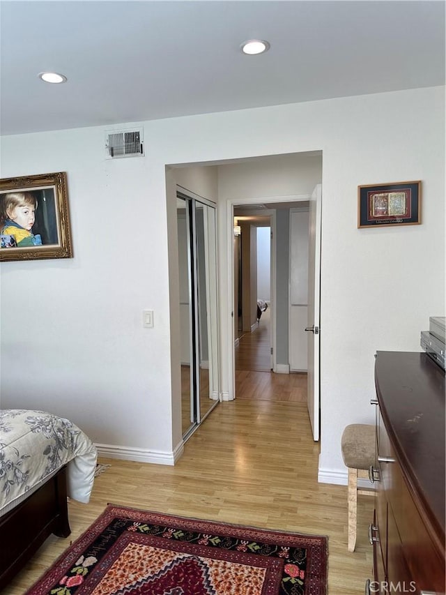 1236 N Columbus Ave Unit 41, Glendale, CA 91202 - bedroom featuring baseboards, light wood-style flooring, recessed lighting, and a closet