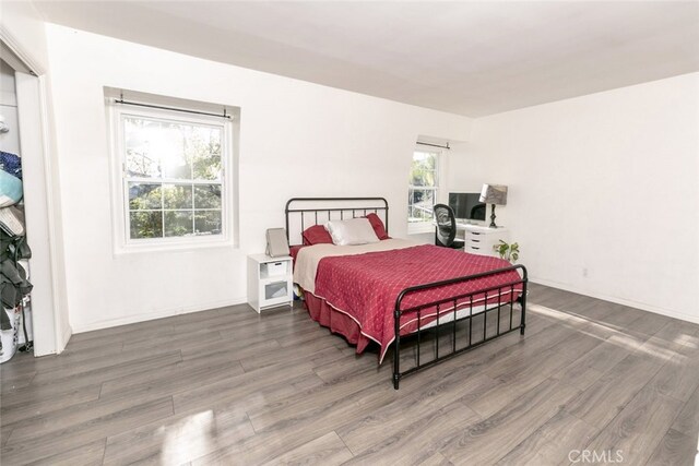 449 Fern Dell Pl, Glendora, CA 91741 - bedroom featuring wood finished floors and multiple windows