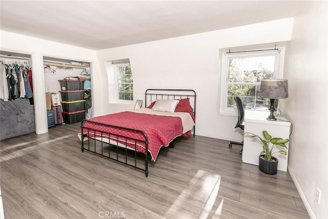 449 Fern Dell Pl, Glendora, CA 91741 - bedroom with wood finished floors, multiple closets, and baseboards