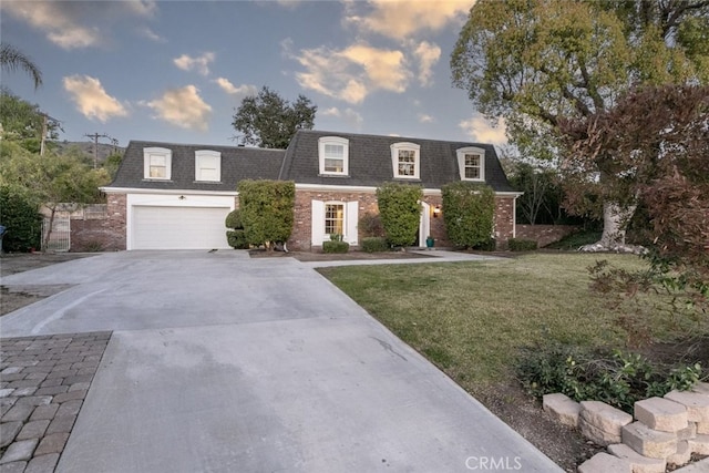 449 Fern Dell Pl, Glendora, CA 91741 - view of property featuring brick siding, driveway, mansard roof, and a front lawn