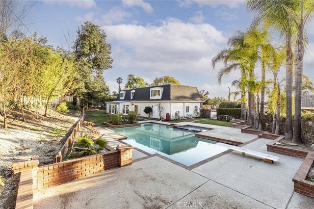 449 Fern Dell Pl, Glendora, CA 91741 - view of swimming pool with a patio, a diving board, and a pool with connected hot tub
