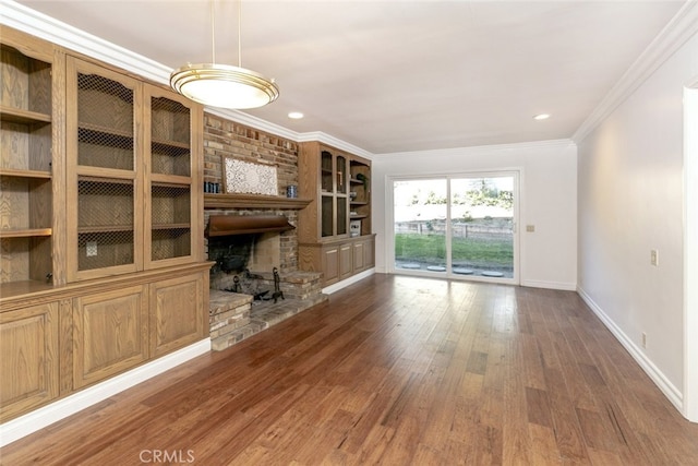 449 Fern Dell Pl, Glendora, CA 91741 - unfurnished living room featuring baseboards, crown molding, a brick fireplace, wood finished floors, and recessed lighting