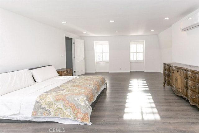 449 Fern Dell Pl, Glendora, CA 91741 - bedroom featuring a wall mounted AC, wood finished floors, recessed lighting, and baseboards