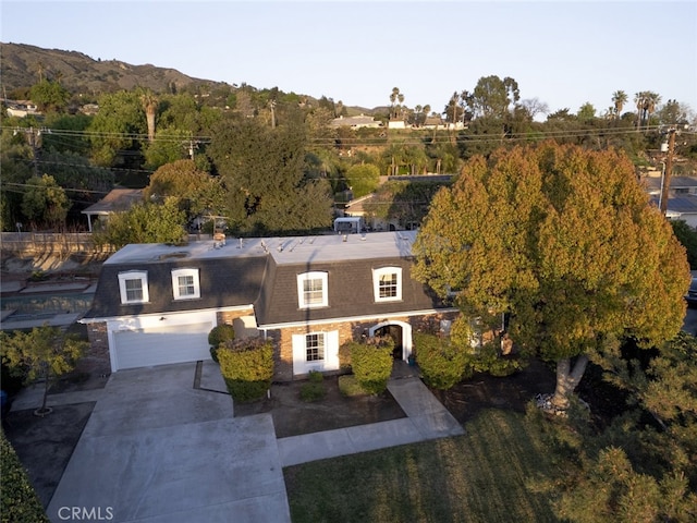 449 Fern Dell Pl, Glendora, CA 91741 - view of front of house featuring an attached garage, driveway, and a mountain view