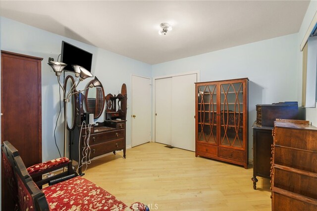 8017 Floral Ave, Los Angeles, CA 90046 - bedroom featuring light wood-type flooring