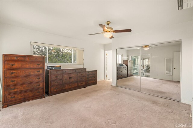 8017 Floral Ave, Los Angeles, CA 90046 - bedroom with a closet, light colored carpet, and a ceiling fan