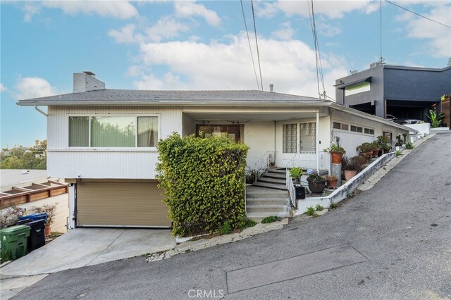 8017 Floral Ave, Los Angeles, CA 90046 - view of front facade with a chimney