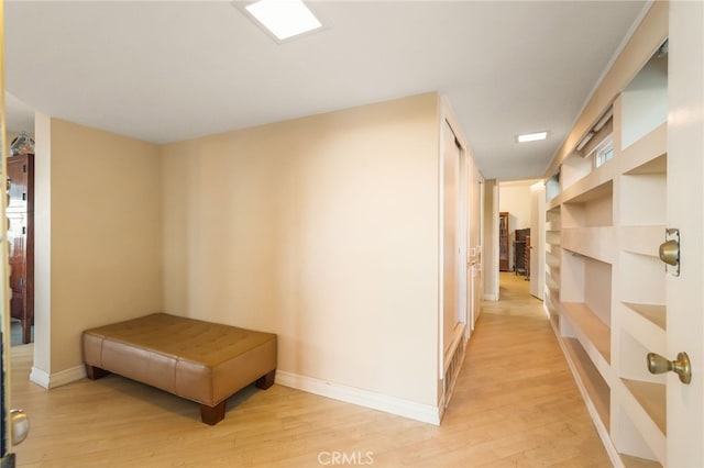 8017 Floral Ave, Los Angeles, CA 90046 - hall with visible vents, light wood-type flooring, and baseboards