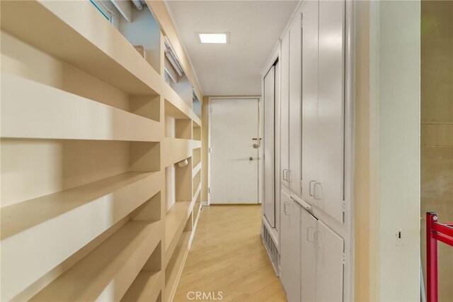 8017 Floral Ave, Los Angeles, CA 90046 - corridor featuring light wood-style floors