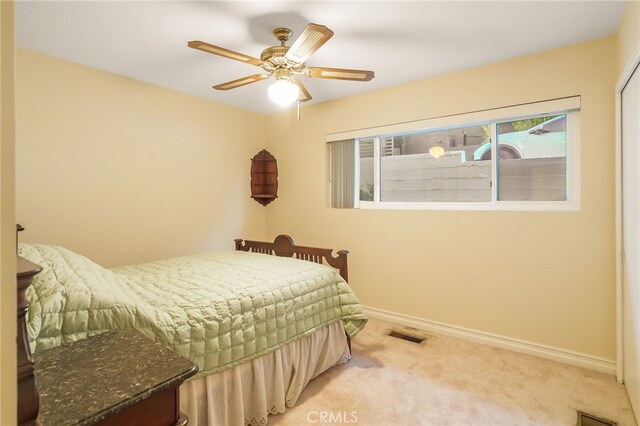8017 Floral Ave, Los Angeles, CA 90046 - bedroom featuring visible vents, baseboards, carpet floors, and ceiling fan