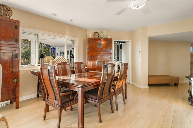 8017 Floral Ave, Los Angeles, CA 90046 - dining area featuring baseboards, ceiling fan, and light wood finished floors