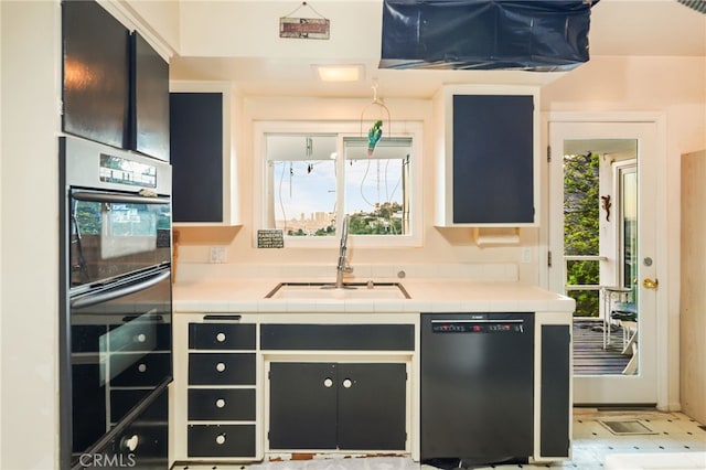 8017 Floral Ave, Los Angeles, CA 90046 - kitchen featuring a sink, black appliances, dark cabinetry, and tile countertops