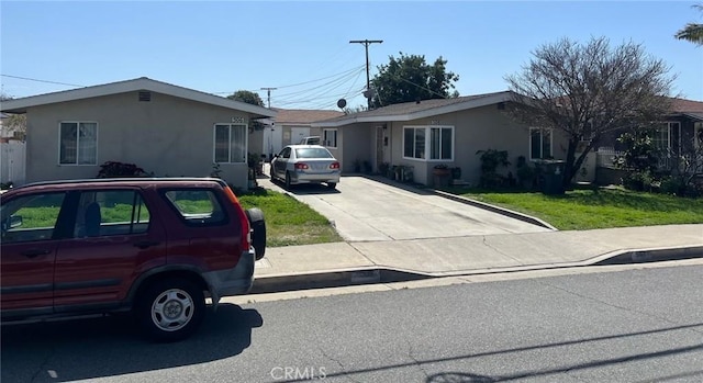 508 W Edinger Ave, Santa Ana, CA 92707 - ranch-style house featuring stucco siding and driveway