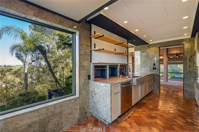 kitchen with recessed lighting, plenty of natural light, stainless steel dishwasher, and a sink