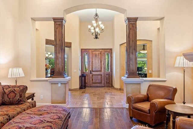 1065 Burnt Rock Way, Templeton, CA 93465 - entryway featuring arched walkways, plenty of natural light, and ornate columns