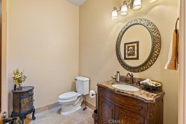 1065 Burnt Rock Way, Templeton, CA 93465 - half bathroom with vanity, toilet, and baseboards