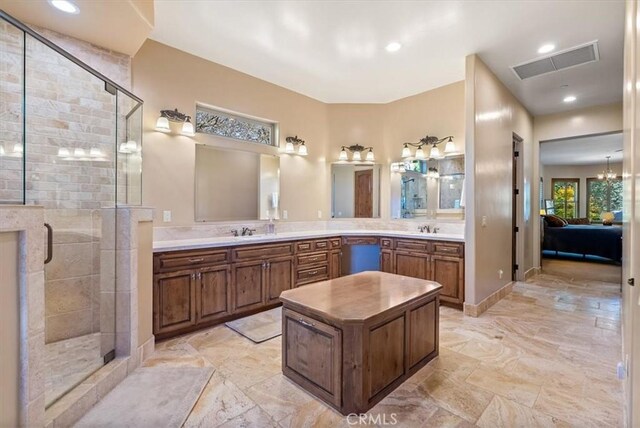 1065 Burnt Rock Way, Templeton, CA 93465 - full bath with a shower stall, a sink, visible vents, and double vanity
