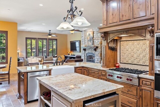 1065 Burnt Rock Way, Templeton, CA 93465 - kitchen with stainless steel appliances, a center island, open floor plan, and a sink