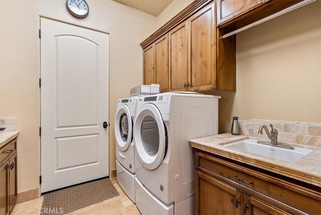 1065 Burnt Rock Way, Templeton, CA 93465 - clothes washing area with cabinet space, washer and dryer, and a sink