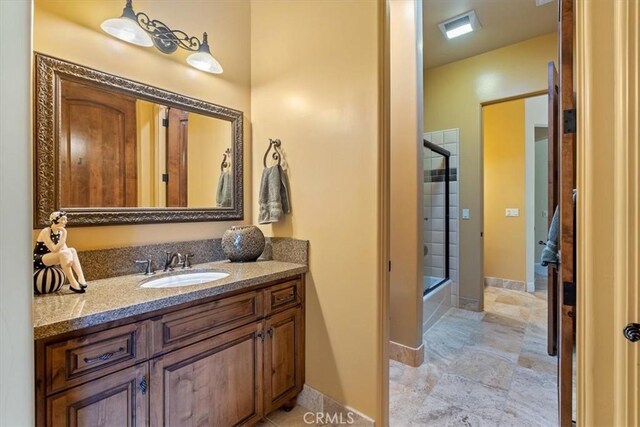 1065 Burnt Rock Way, Templeton, CA 93465 - bathroom with baseboards, visible vents, and vanity