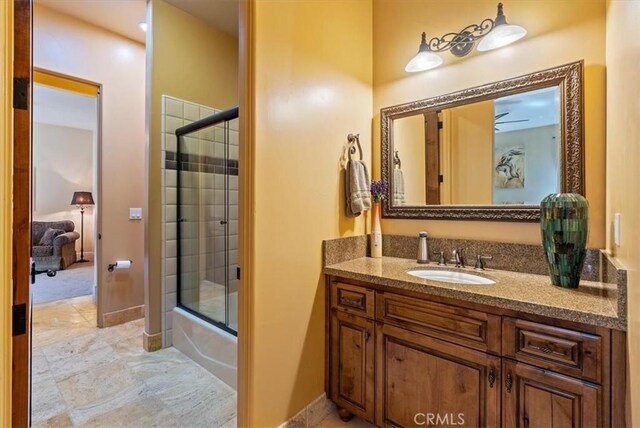 1065 Burnt Rock Way, Templeton, CA 93465 - bathroom with baseboards, vanity, and enclosed tub / shower combo