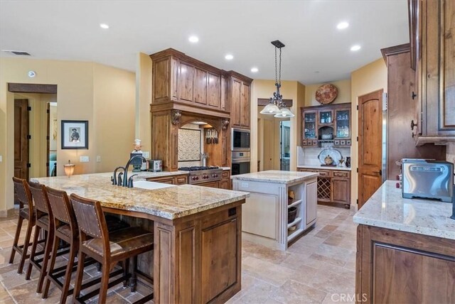1065 Burnt Rock Way, Templeton, CA 93465 - kitchen featuring open shelves, backsplash, visible vents, a peninsula, and appliances with stainless steel finishes