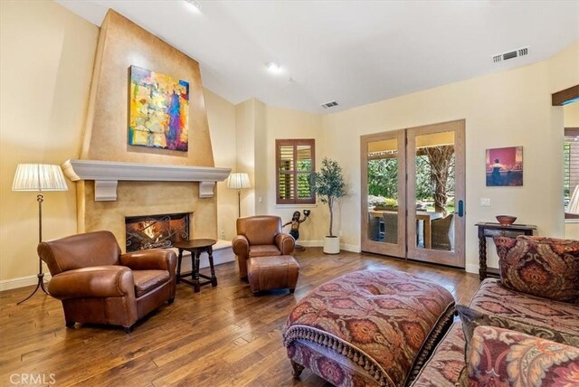 1065 Burnt Rock Way, Templeton, CA 93465 - living room featuring french doors, visible vents, and plenty of natural light