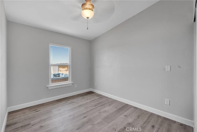 36090 Old Woman Springs Rd, Lucerne Valley, CA 92356 - spare room featuring ceiling fan, baseboards, and wood finished floors