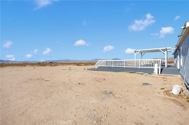 36090 Old Woman Springs Rd, Lucerne Valley, CA 92356 - view of yard featuring a wooden deck and a pergola