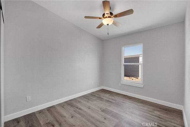 36090 Old Woman Springs Rd, Lucerne Valley, CA 92356 - spare room featuring ceiling fan, baseboards, and wood finished floors