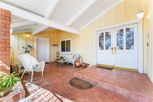 doorway to property featuring french doors and a patio area