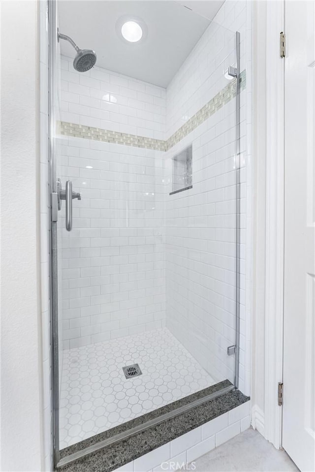 full bath featuring a stall shower