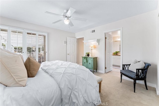 bedroom with light colored carpet, baseboards, access to exterior, and connected bathroom