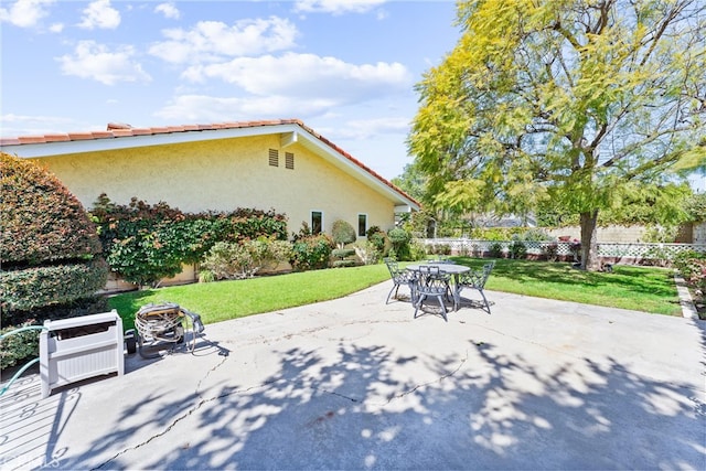 view of patio with outdoor dining area
