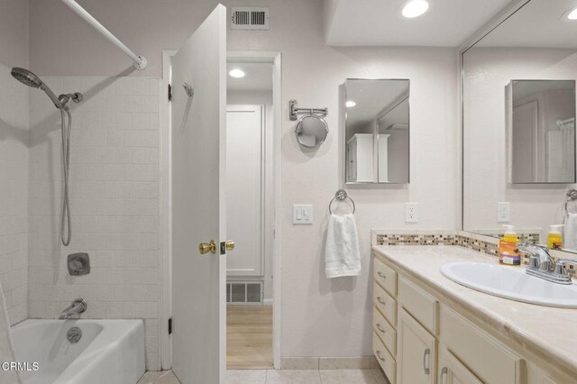 5125 W Wooley Rd Unit 5, Oxnard, CA 93035 - bathroom with shower / tub combination, vanity, recessed lighting, and tile patterned floors