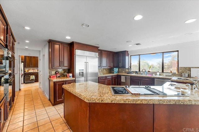 5274 Margaret, Bonita, CA 91902 - kitchen featuring decorative backsplash, a sink, stainless steel appliances, and light tile patterned floors